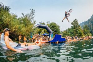 River jumper in mid-air