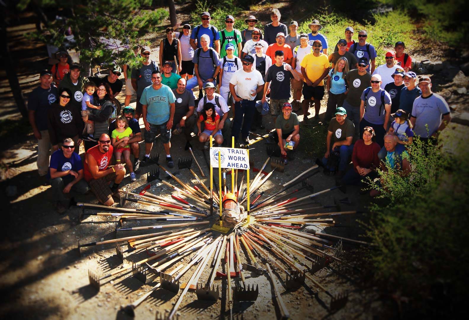 Large group of people and trail tools