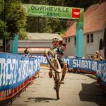 Racer wheelie at finish of Downieville Classic